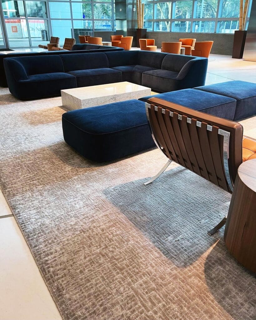 gray lobby rugs by Jamie Stern