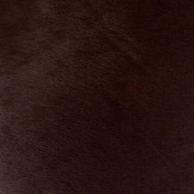 dark red hair on hide leather