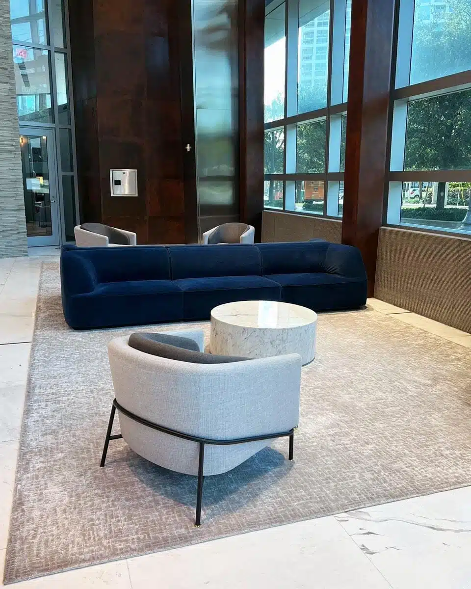 gray lobby rugs by Jamie Stern