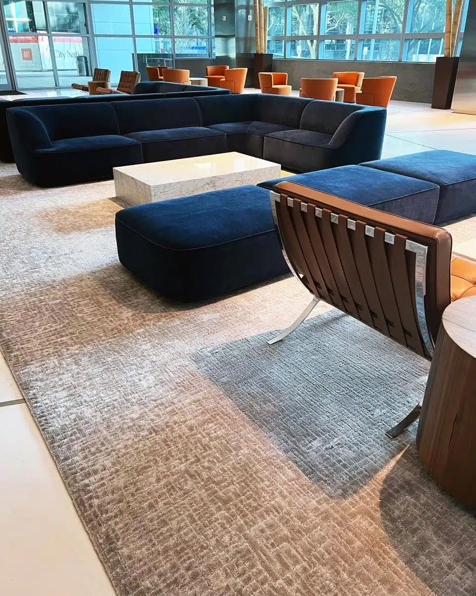 gray lobby rugs by Jamie Stern