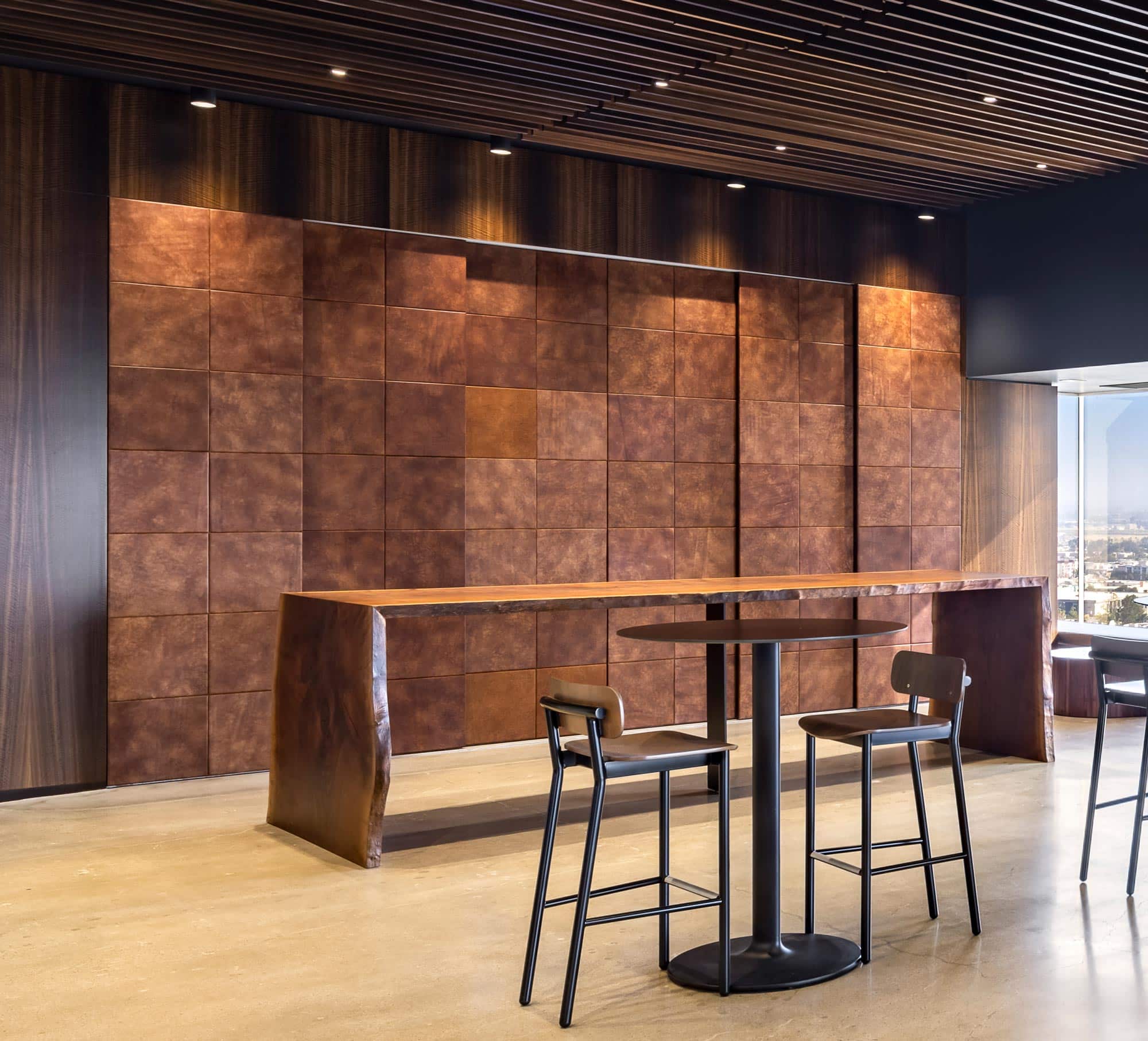 Leather paneled wall by Jamie Stern for Reyes Coca-Cola