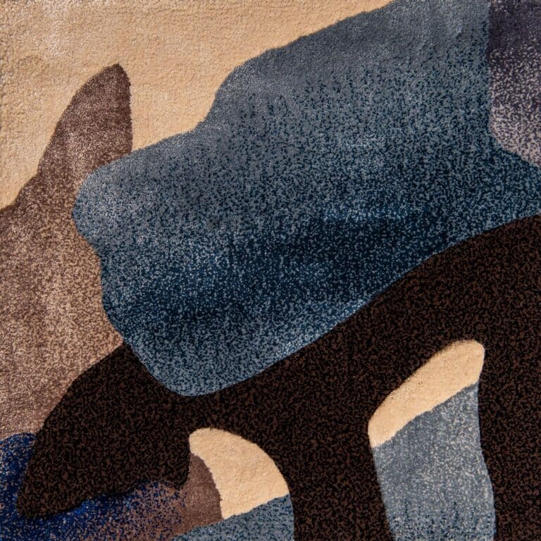 Lycette from Jamie Stern is a hand-tufted multi level cut pile area rug made of New Zealand wool and features bamboo silk accents.