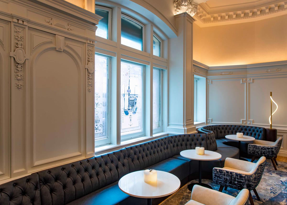 Curved custom banquettes made by Jamie Stern for the Algonquin Hotel