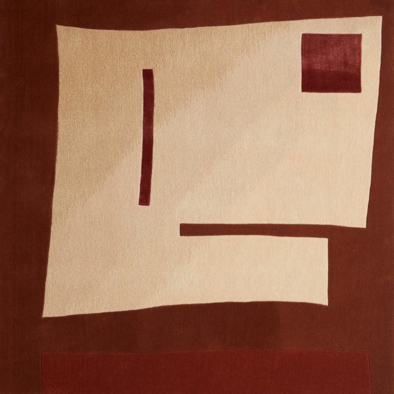 Block form by Dutch East Design is a beige hand-tufted rug