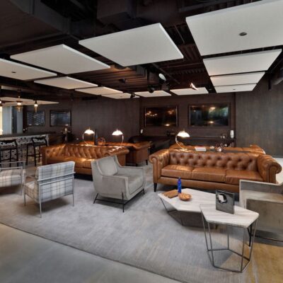 Presidents Plaza lobby with Jamie Stern Rug and Baker Street Sofa